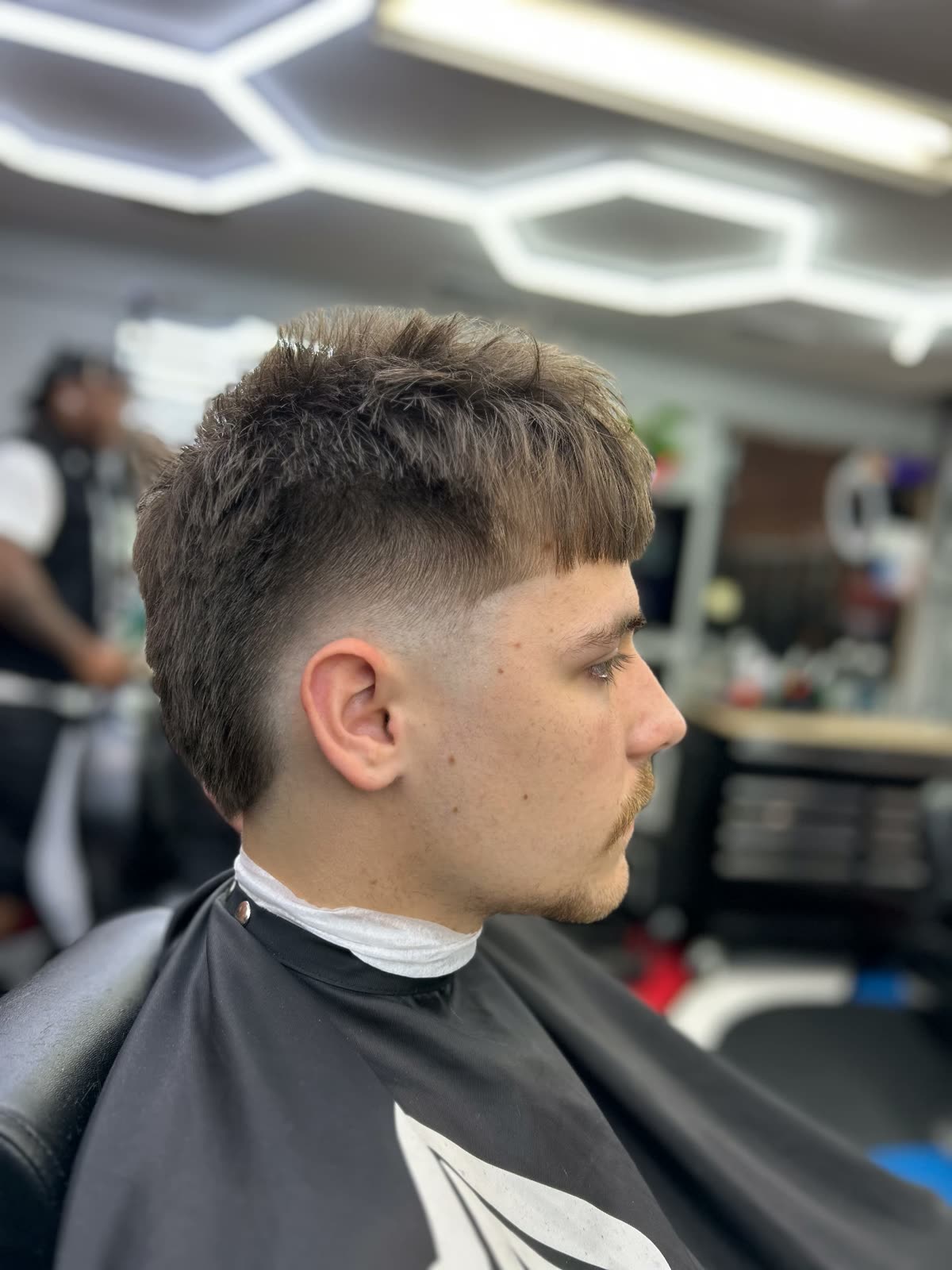 Textured crop with a low taper fade